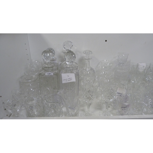 138 - Crystal and glass to include decanters, glasses, bowls, sundae dishes etc (one shelf).