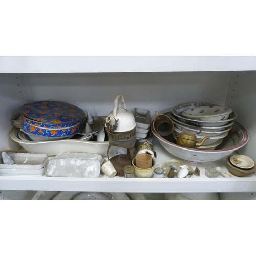 141 - Chamber pots, water jugs, soap dishes, toilet bowls, bed slipper pans, wash basins etc (three shelve... 