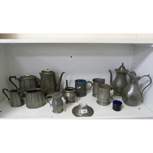 144 - Assorted pewter to include tankards, teapot, water jug, inkwell inscribed 'HW' (Probably Hugh Wallis... 