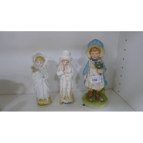 156 - Holly Hobby Creation figure, pair of German figures, two lustre jugs, glass vases etc (one shelf).