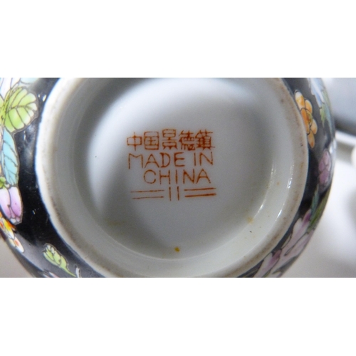 170 - Reproduction Chinese mille noir pattern tablewares to include tureen, platter, ladles, rice bowls, d... 