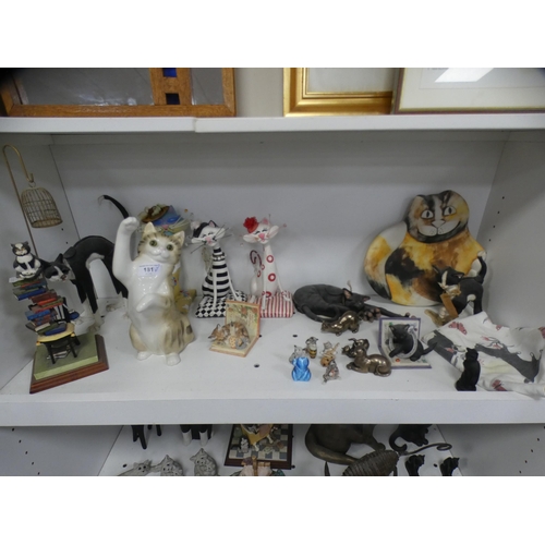 181 - Large collection of assorted cat ornaments and collectables (three shelves).