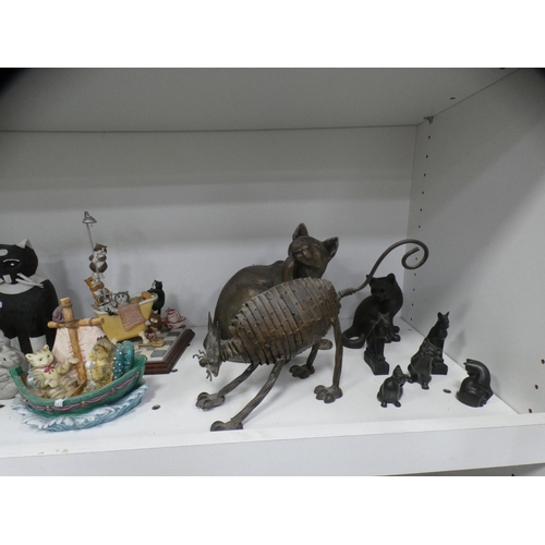 181 - Large collection of assorted cat ornaments and collectables (three shelves).