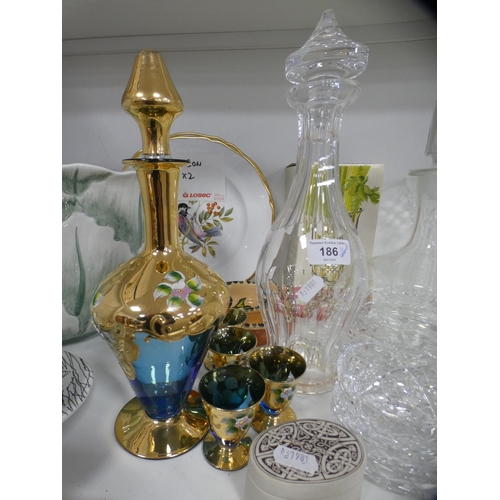 186 - Crystal and glassware to include decanters, candlesticks, bowls, also a part liqueur set, planter, c... 