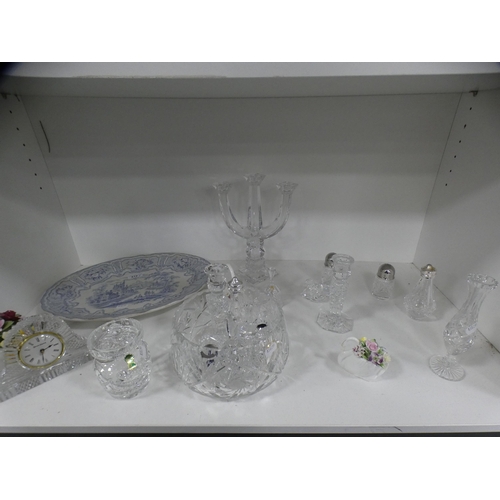 212 - Crystal and glassware to include a mantel clock, bowl, candlesticks, preserve jar and cover, candela... 