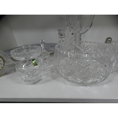 212 - Crystal and glassware to include a mantel clock, bowl, candlesticks, preserve jar and cover, candela... 