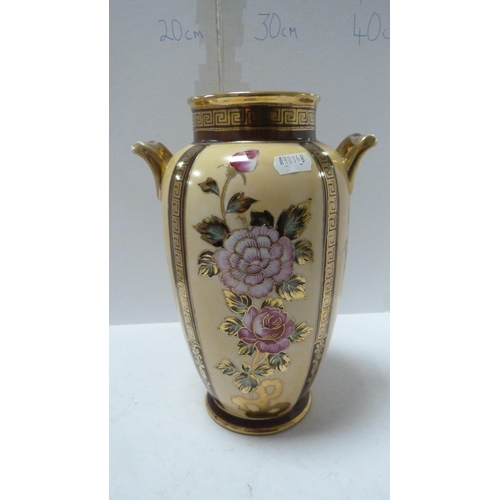 217 - Pair of Noritake floral and gilt decorated twin-handled vases.  (2)