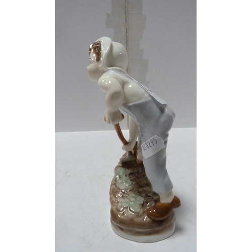 222 - Royal Worcester figure, 'Saturday's Child Works Hard for a Living'.