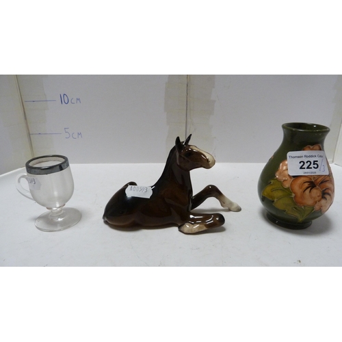 225 - Small Moorcroft tube-lined spill vase on green ground, Beswick figure of a foal and a small glass cu... 