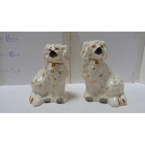 226 - Pair of Beswick small wally dogs, Beswick figure of a cow and a Beswick figure of a dog.  (4)