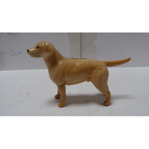 226 - Pair of Beswick small wally dogs, Beswick figure of a cow and a Beswick figure of a dog.  (4)