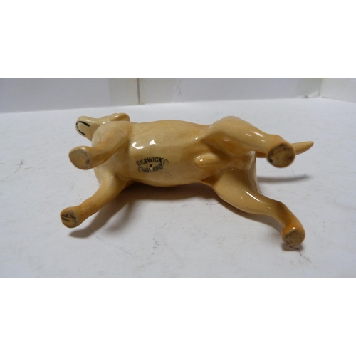 226 - Pair of Beswick small wally dogs, Beswick figure of a cow and a Beswick figure of a dog.  (4)