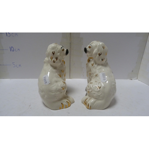 226 - Pair of Beswick small wally dogs, Beswick figure of a cow and a Beswick figure of a dog.  (4)