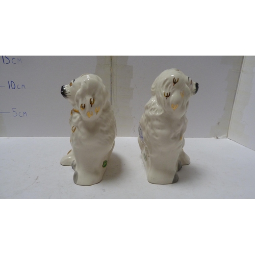 226 - Pair of Beswick small wally dogs, Beswick figure of a cow and a Beswick figure of a dog.  (4)