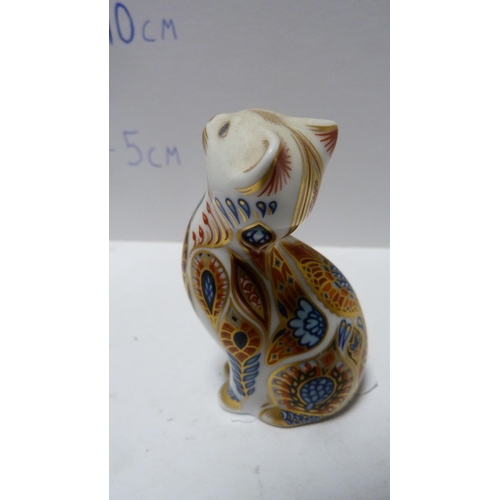 231 - Two Royal Crown Derby paperweights modelled as cats, with silvered stoppers.  (2)