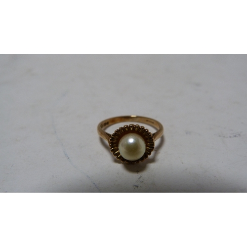 237 - 9ct gold pearl-set ring, 2.5g gross, and a gold-mounted ball pendant.  (2)