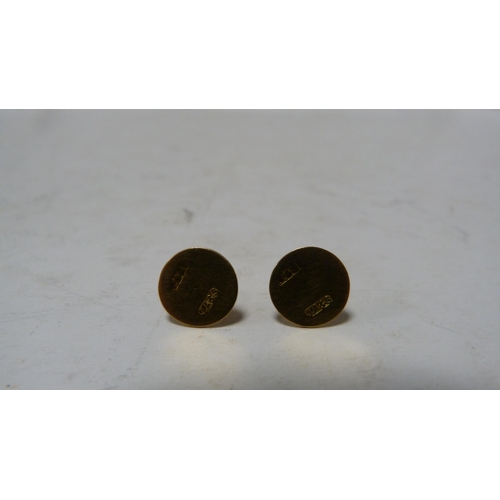 239 - Set of four 9ct gold-mounted dress studs, 4.7g gross.