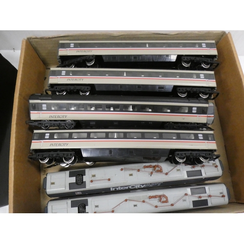 25 - Two boxes containing Inter City APT and 125 model engines and carriages.