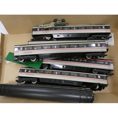 25 - Two boxes containing Inter City APT and 125 model engines and carriages.