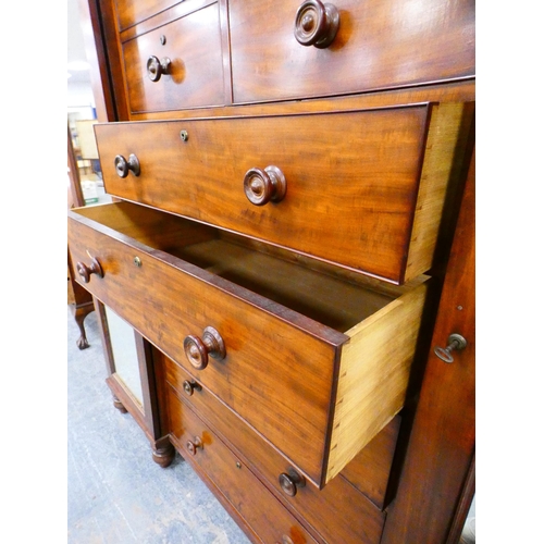 273 - Victorian mahogany combination wardrobe with assorted drawers to the centre flanked by glazed doors.