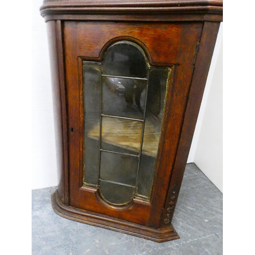 275 - Oak corner cabinet with glazed doors.