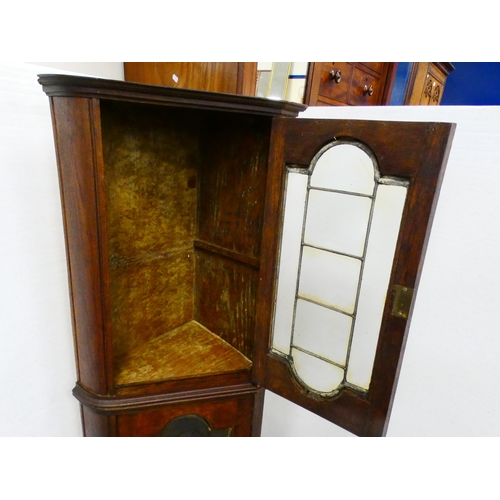 275 - Oak corner cabinet with glazed doors.