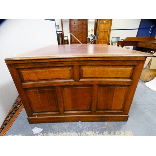 285 - 1930s oak partner's desk with skiver to the top.