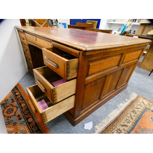 285 - 1930s oak partner's desk with skiver to the top.