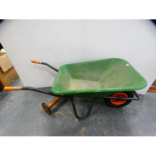 289 - Garden wheelbarrow and assorted garden tools to include spade, fork, loppers etc.