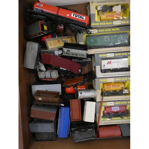 29 - Two boxes containing assorted rolling stock etc., and a Trix Train Western Crusader loco.