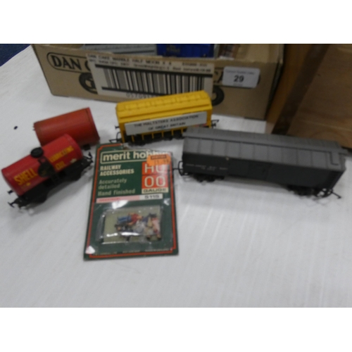 29 - Two boxes containing assorted rolling stock etc., and a Trix Train Western Crusader loco.