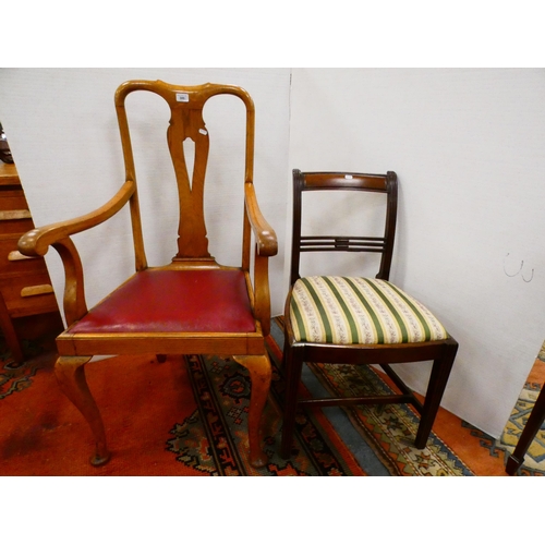 300 - Oak elbow chair and a Regency-style mahogany dining chair.  (2)