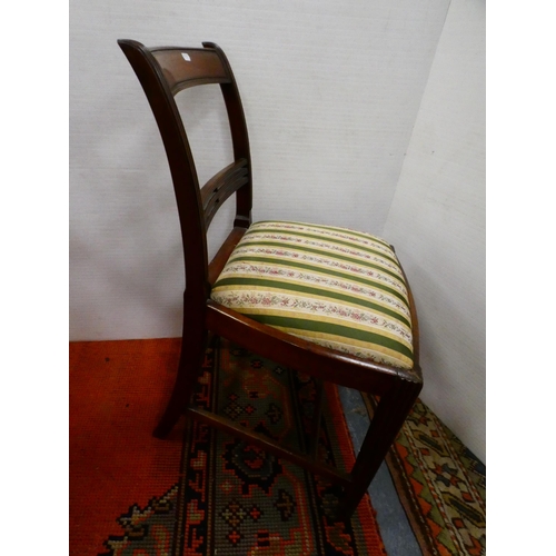 300 - Oak elbow chair and a Regency-style mahogany dining chair.  (2)