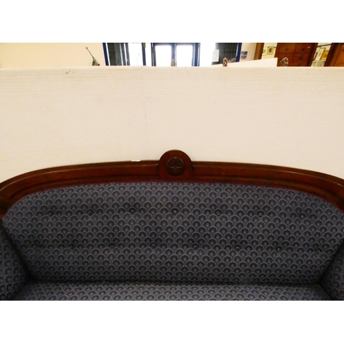 301 - Victorian mahogany-framed parlour sofa with scroll back and scroll arms, on turned and reeded suppor... 