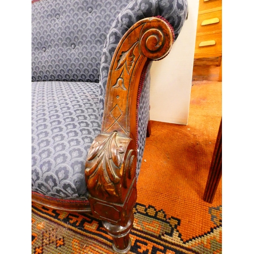 301 - Victorian mahogany-framed parlour sofa with scroll back and scroll arms, on turned and reeded suppor... 