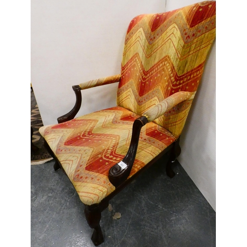 302 - Reproduction upholstered library armchair.