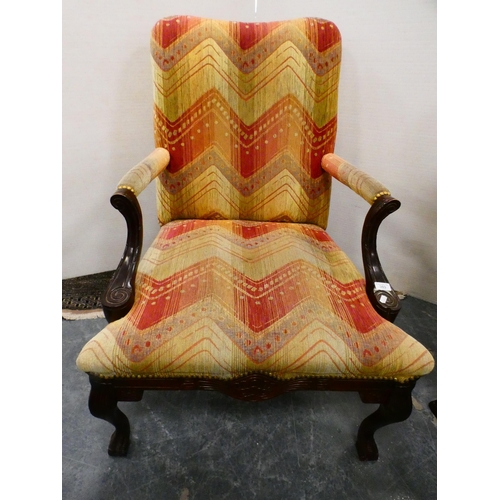 303 - Reproduction upholstered library armchair.