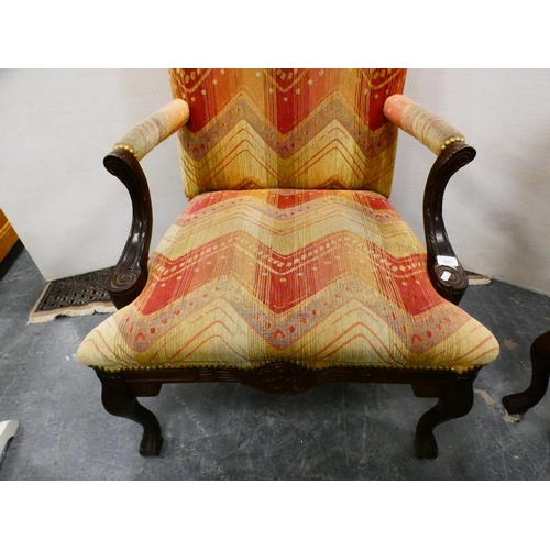 303 - Reproduction upholstered library armchair.