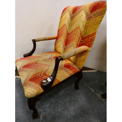 303 - Reproduction upholstered library armchair.