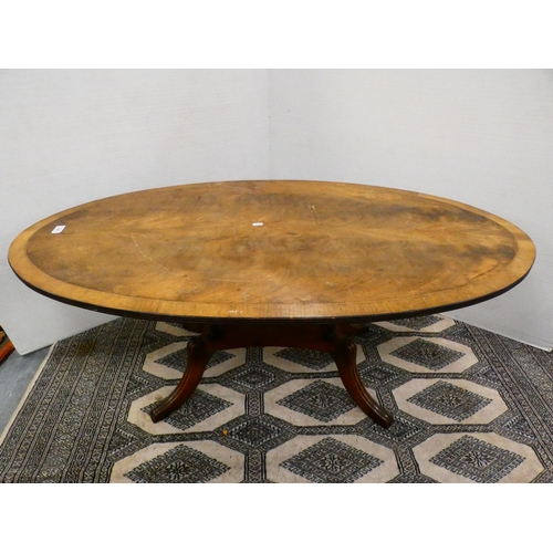 305 - Oval table on quadripartite supports and a rectangular shaped-top table.  (2)