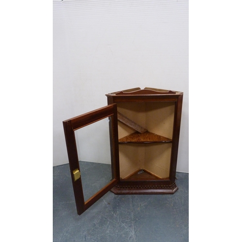 321 - Mahogany drop-leaf Sutherland table and a glazed corner cupboard.  (2)