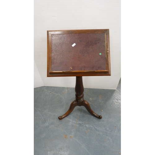 333 - Victorian rosewood music stand on turned column and tripod base.