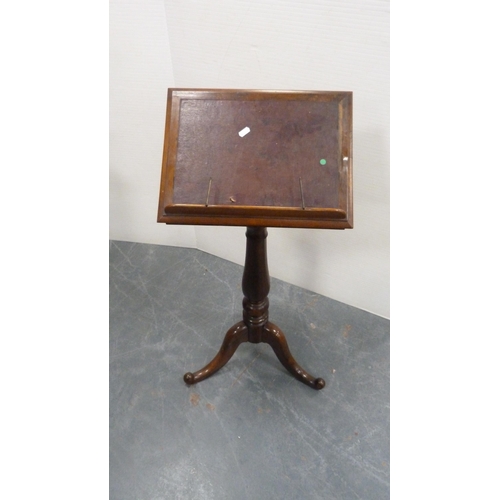 333 - Victorian rosewood music stand on turned column and tripod base.