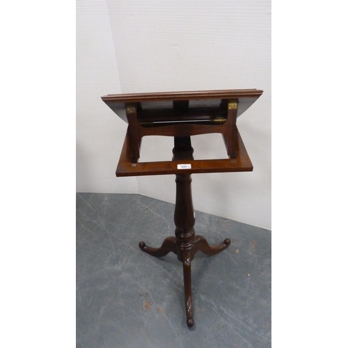 333 - Victorian rosewood music stand on turned column and tripod base.