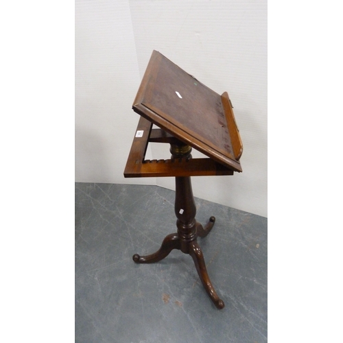 333 - Victorian rosewood music stand on turned column and tripod base.