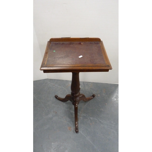 333 - Victorian rosewood music stand on turned column and tripod base.