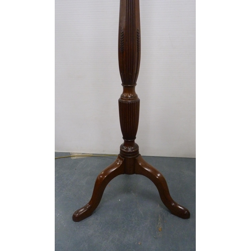 337 - Mahogany floor lamp on tripod base with shade.