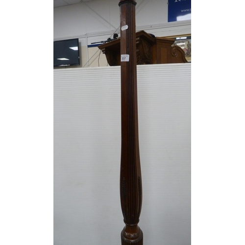 337 - Mahogany floor lamp on tripod base with shade.