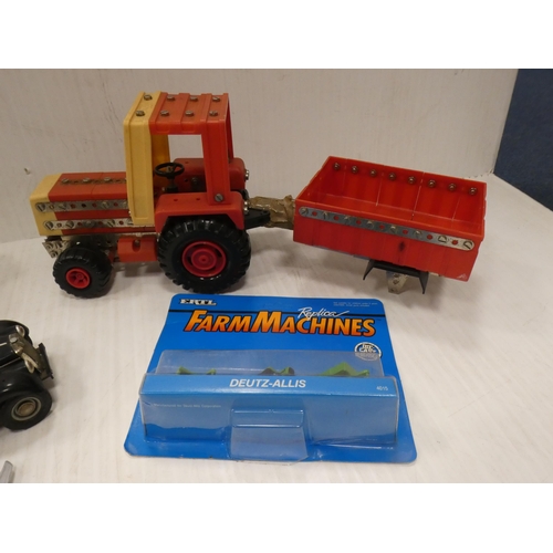 34 - Carton containing a Meccano tractor, model cars, planes etc.