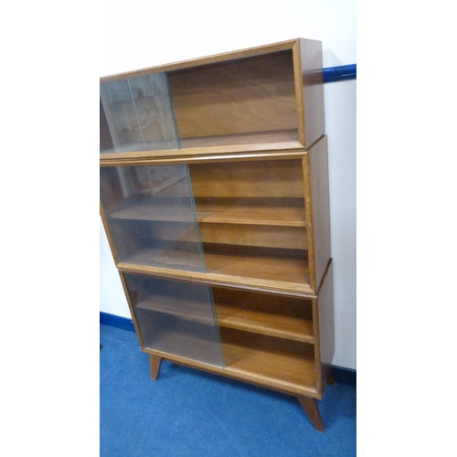 341 - Vintage walnut sectional bookcase by Beresford & Hicks, with glazed sliding doors.